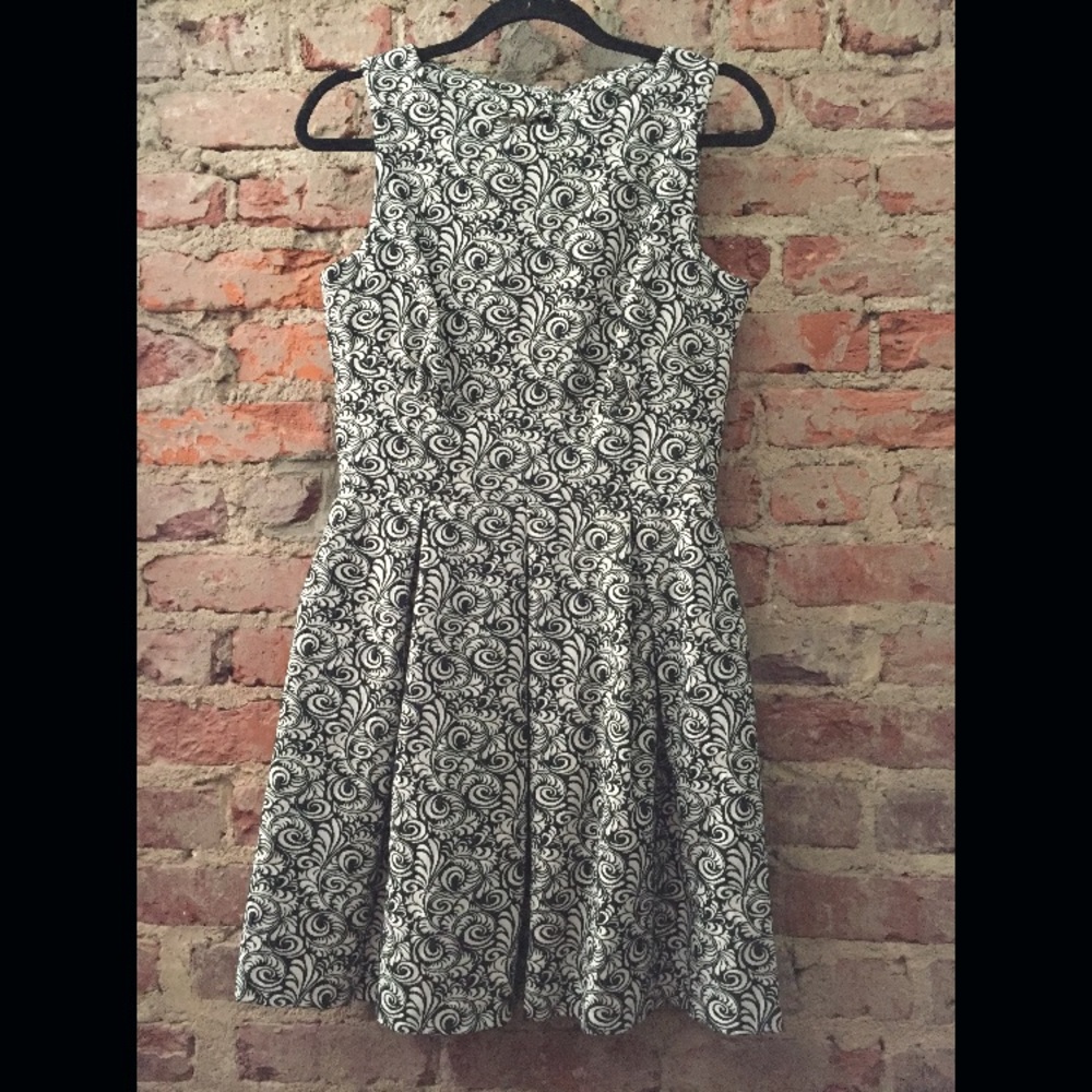 NWT Black and white doodle dress. Hidden pockets